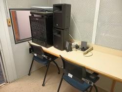 Soundproof room with record player and speaker